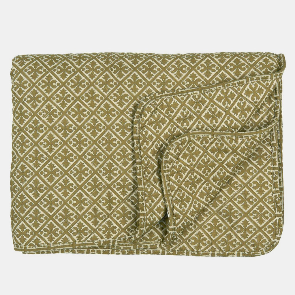 Olive block print throw quilt in cotton in Amsterdam Netherlands