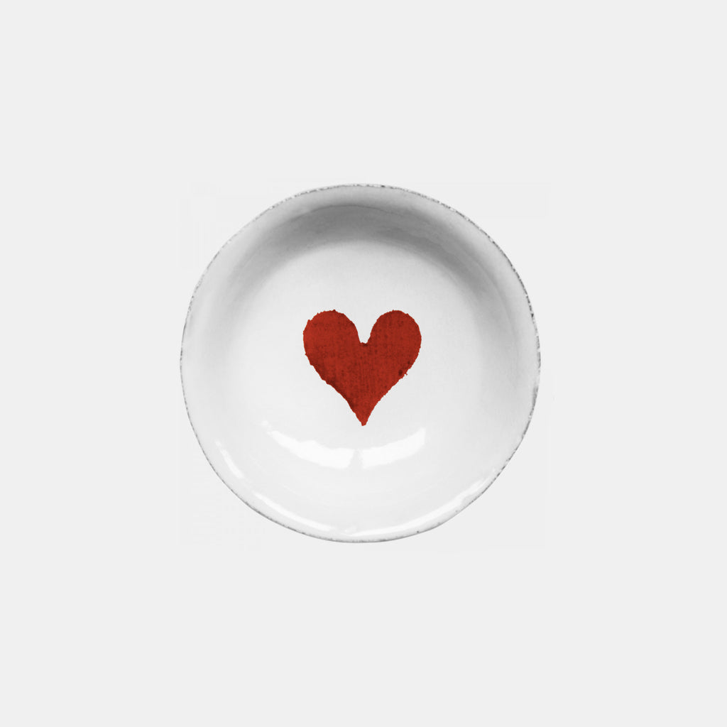 Small red heart on white ceramic dish plate by Astier de Villatte in Amsterdam Nederlands