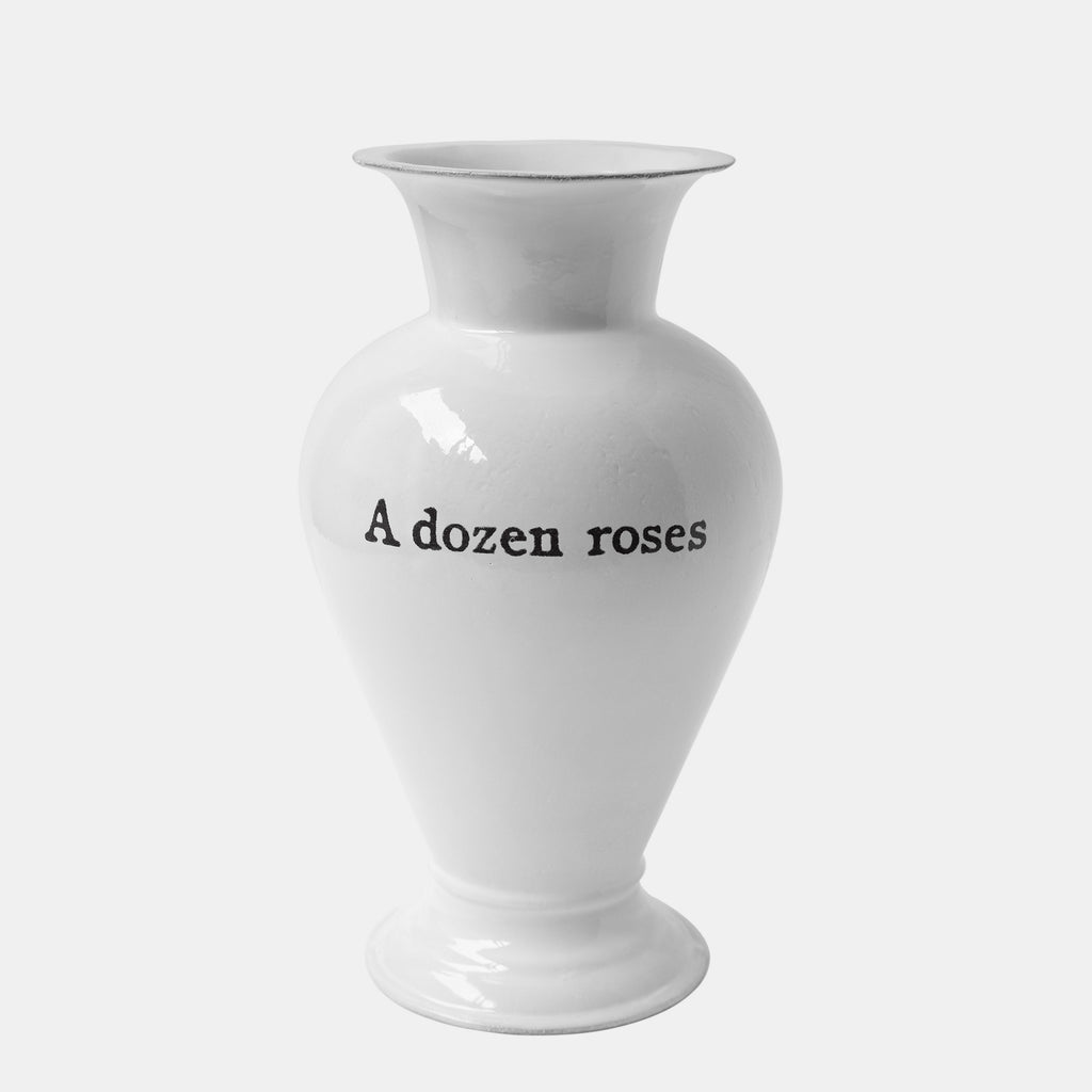 Astier de Villatte white vase with text saying A Dozen Roses in Amsterdam Netherlands