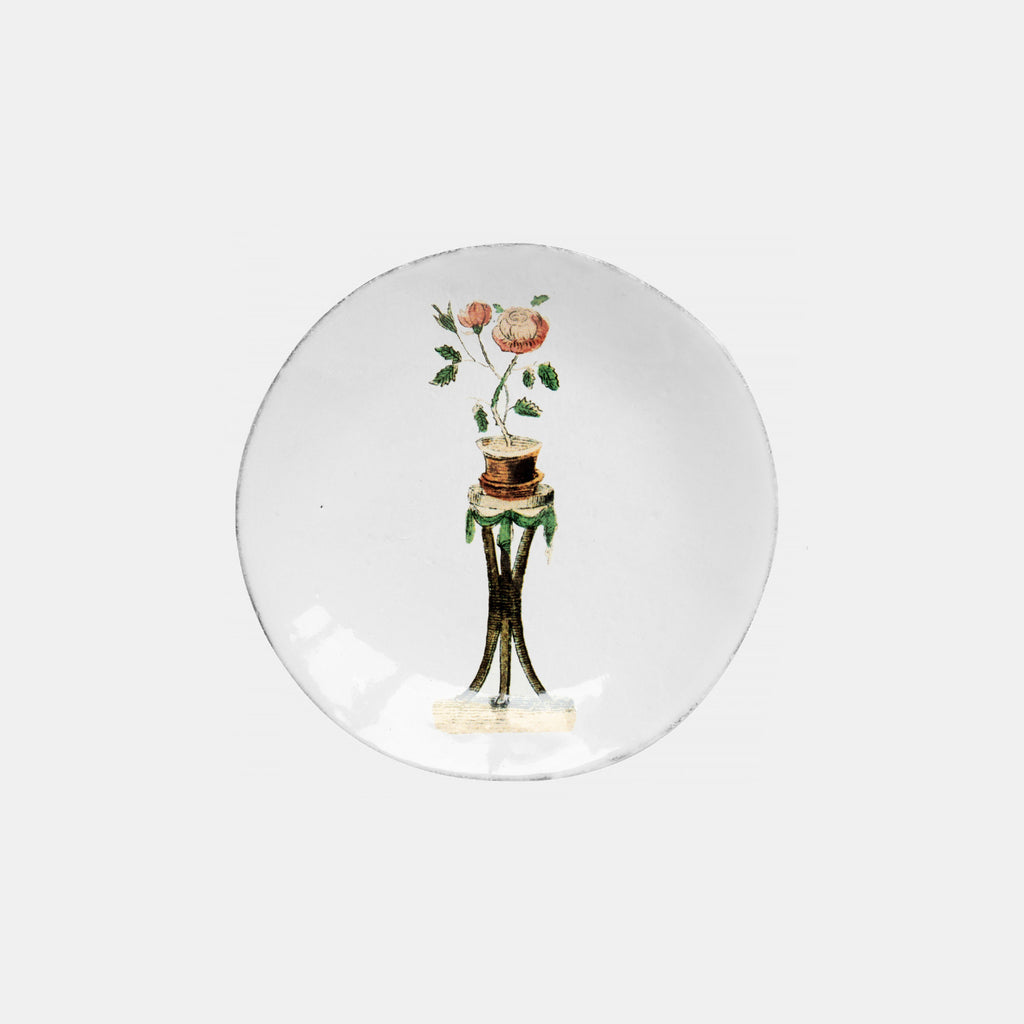 White ceramic dish plate with rosebush on plant stand by Astier de Villatte in Amsterdam Nederlands