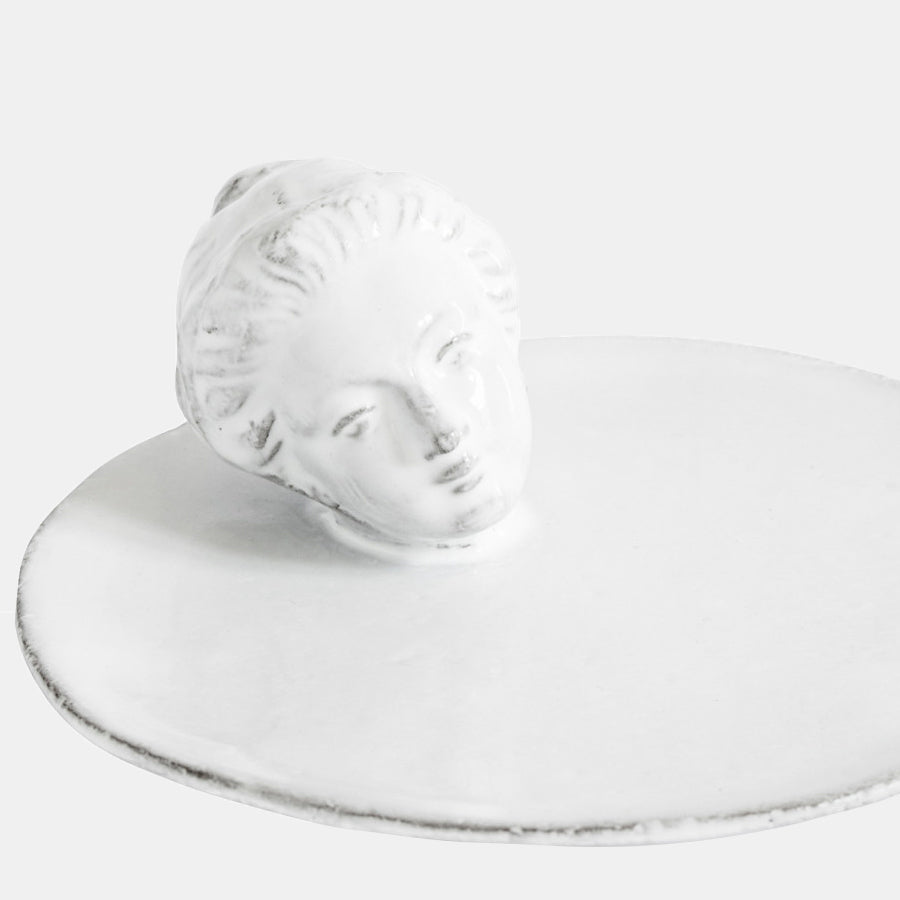 White ceramic dish and incense holder with Marie antoinette head close up