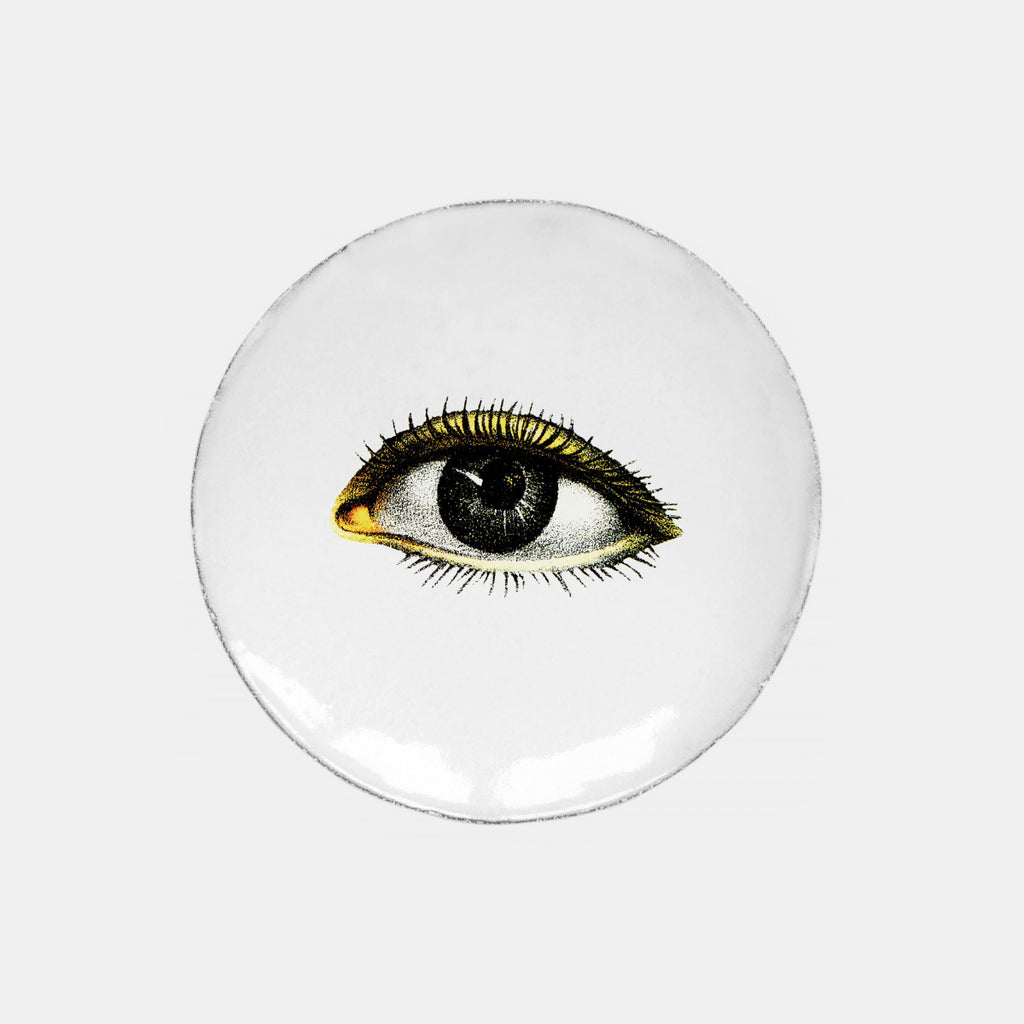 White ceramic plate with single eye by john derian left