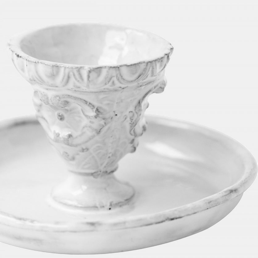 White ceramic dish and incense holder with fountain shape close up