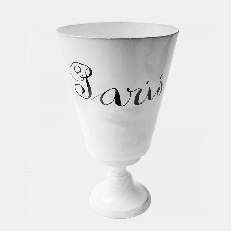 White ceramic vase with paris on it