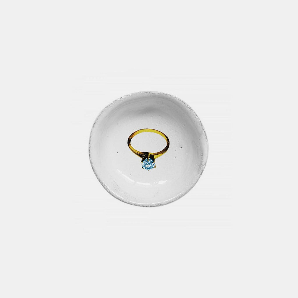 small white ceramic dish with diamond ring image by John Derian