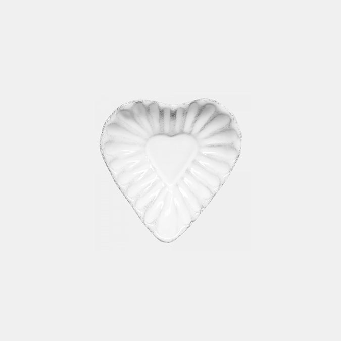 Small white ceramic heart dish with scalloped detail by Astier de Villatte in Amsterdam Nederlands