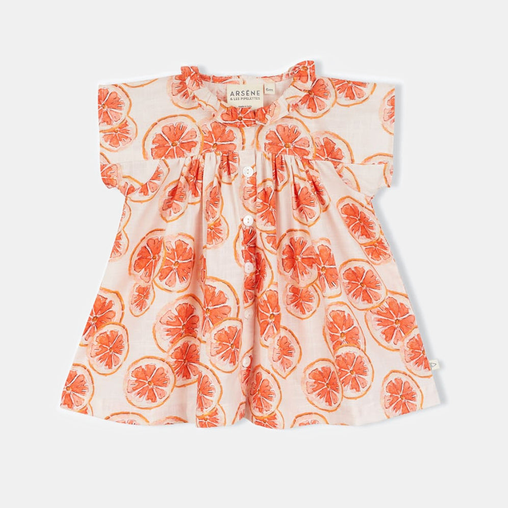 Cute grapefruit print on baby dress by Arsene in Amsterdam Nederlands