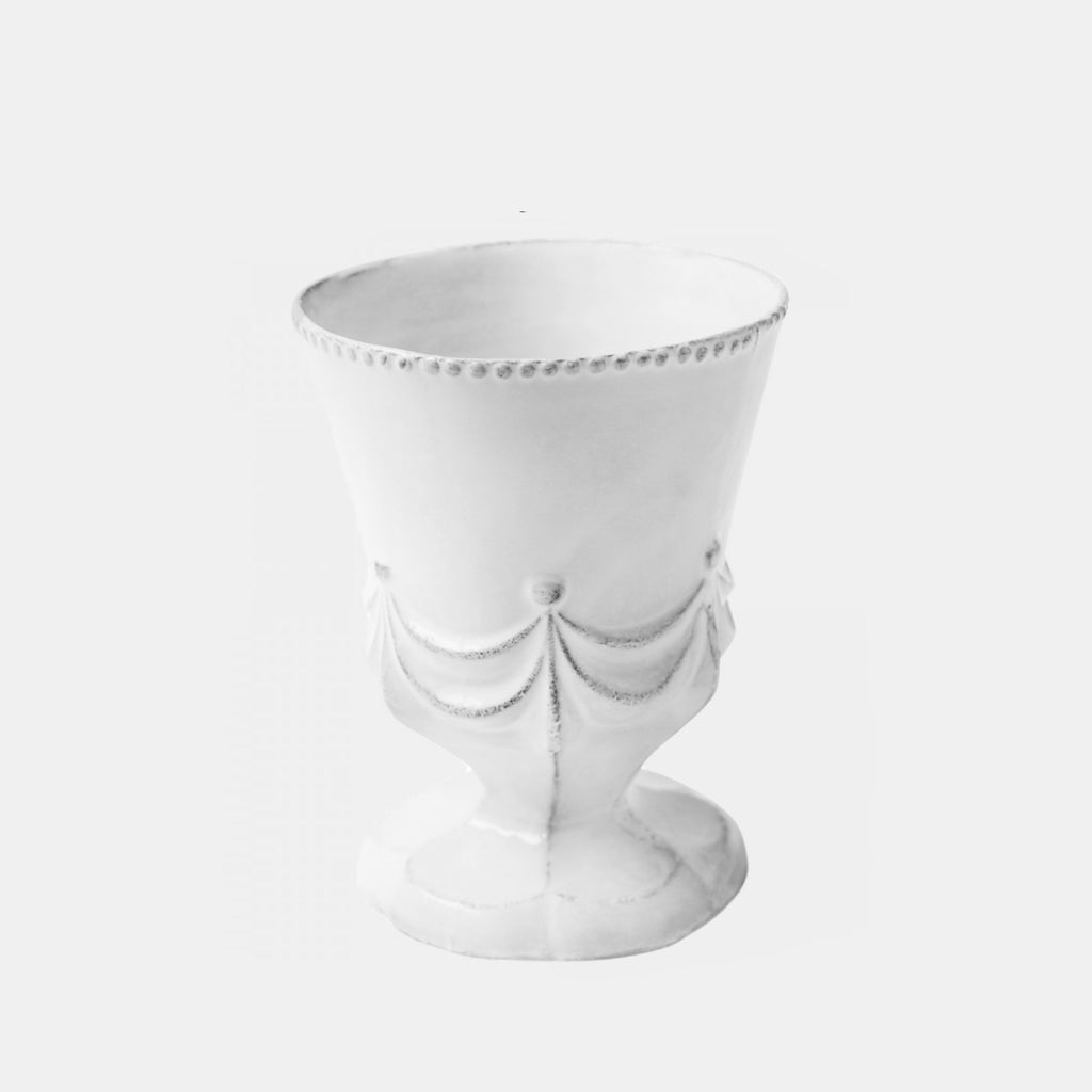 Small white ceramic vase with drapery details by Astier de Villatte in Amsterdam Nederlands