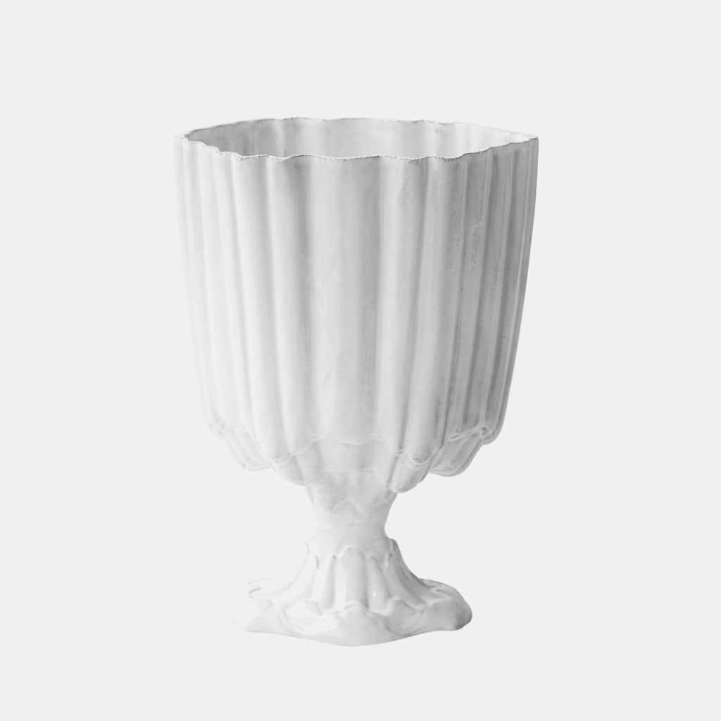 White fluted vase with floret