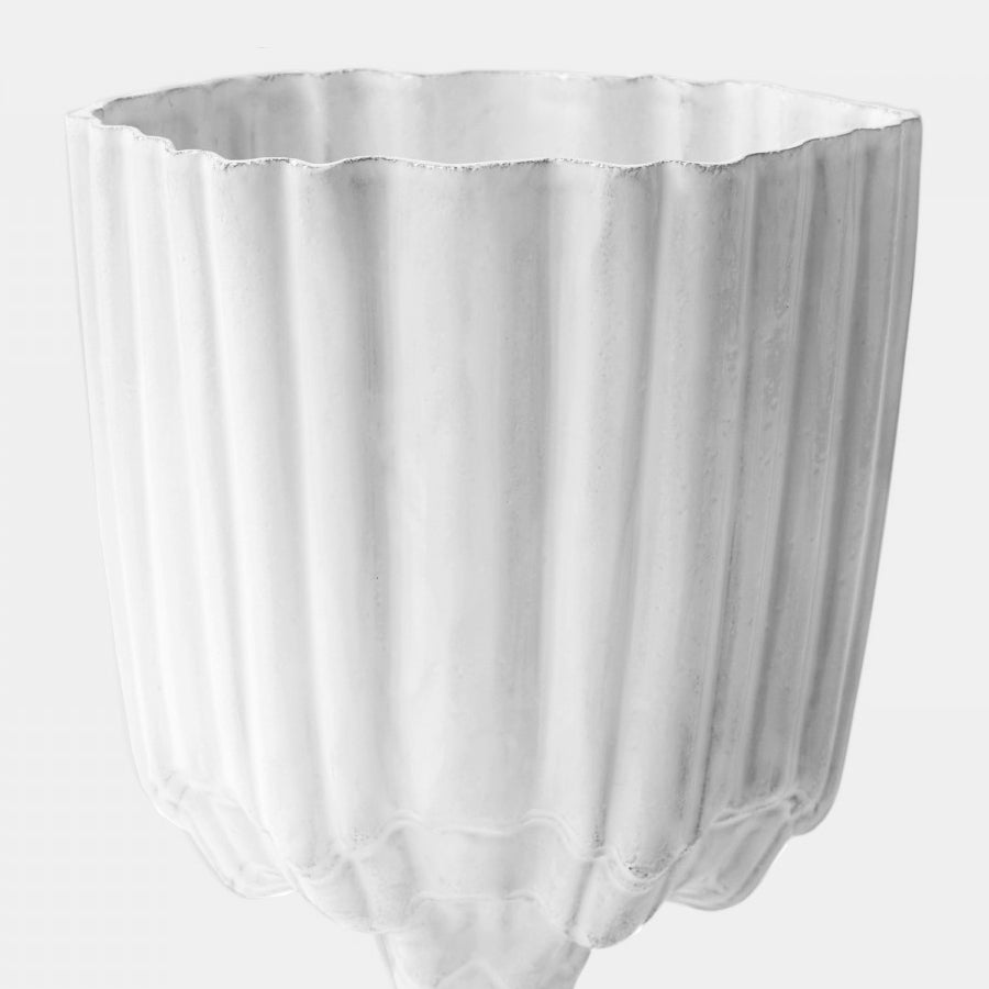 White fluted vase with floret close up