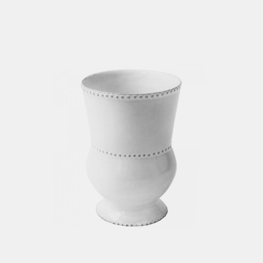 Small white ceramic vase with dot piping detail