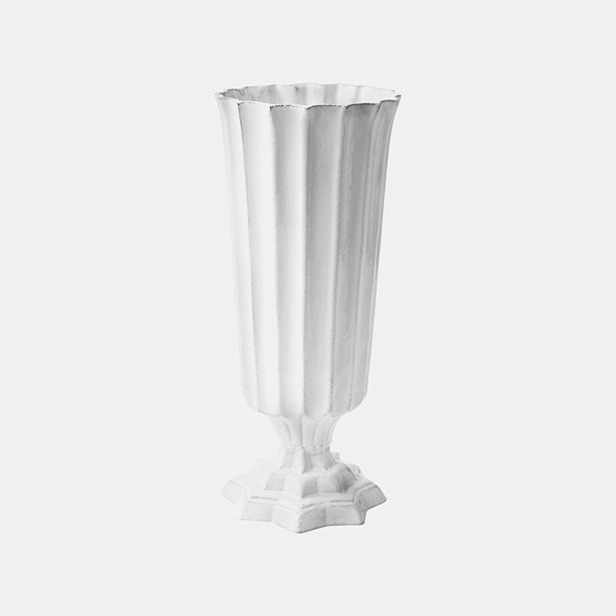 Tall white ceramic vase with scalloped detail by Astier de Villatte in Amsterdam Nederlands